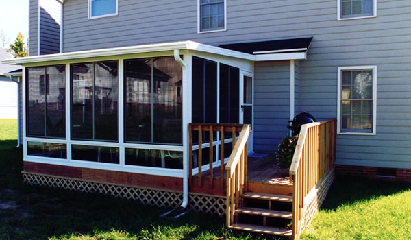 backyard deck with patio enclosure